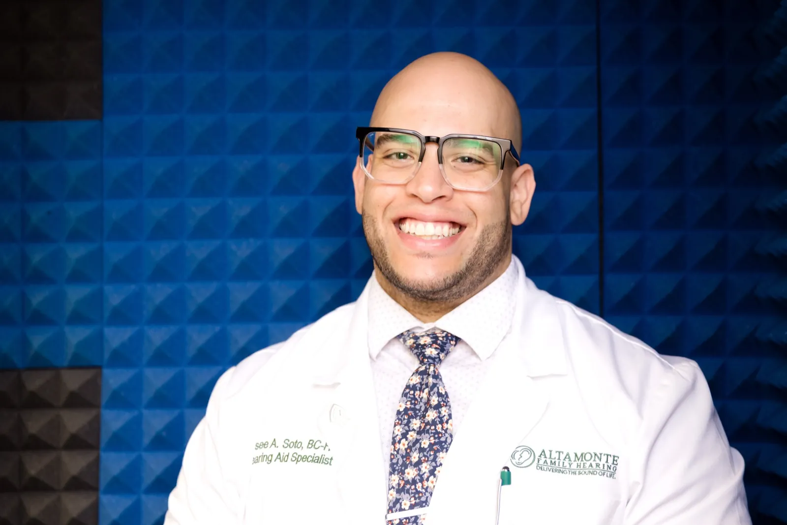 Jaysee Soto, HAS, BC-HIS, in the sound booth in his white coat